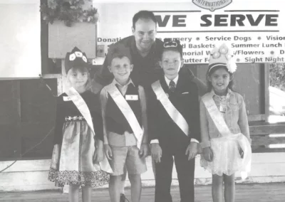 Chairman, Anton Neff, with the Apple Butter Festival royalty.