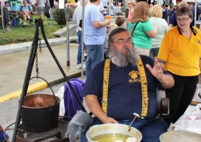 Former Spencer Lions Club President, Rusty Freeman, cooking biscuits at the Apple Butter Festival in Spencer, IN.